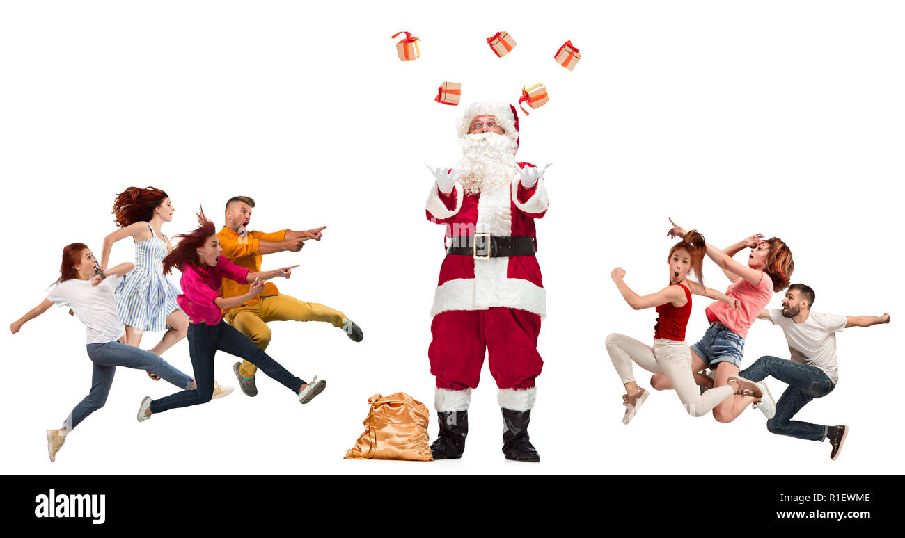 Felice Natale in esecuzione di persone su sfondo bianco. A lunghezza piena di persone con diverse professioni. Il Natale e il concetto di vacanza Foto Stock