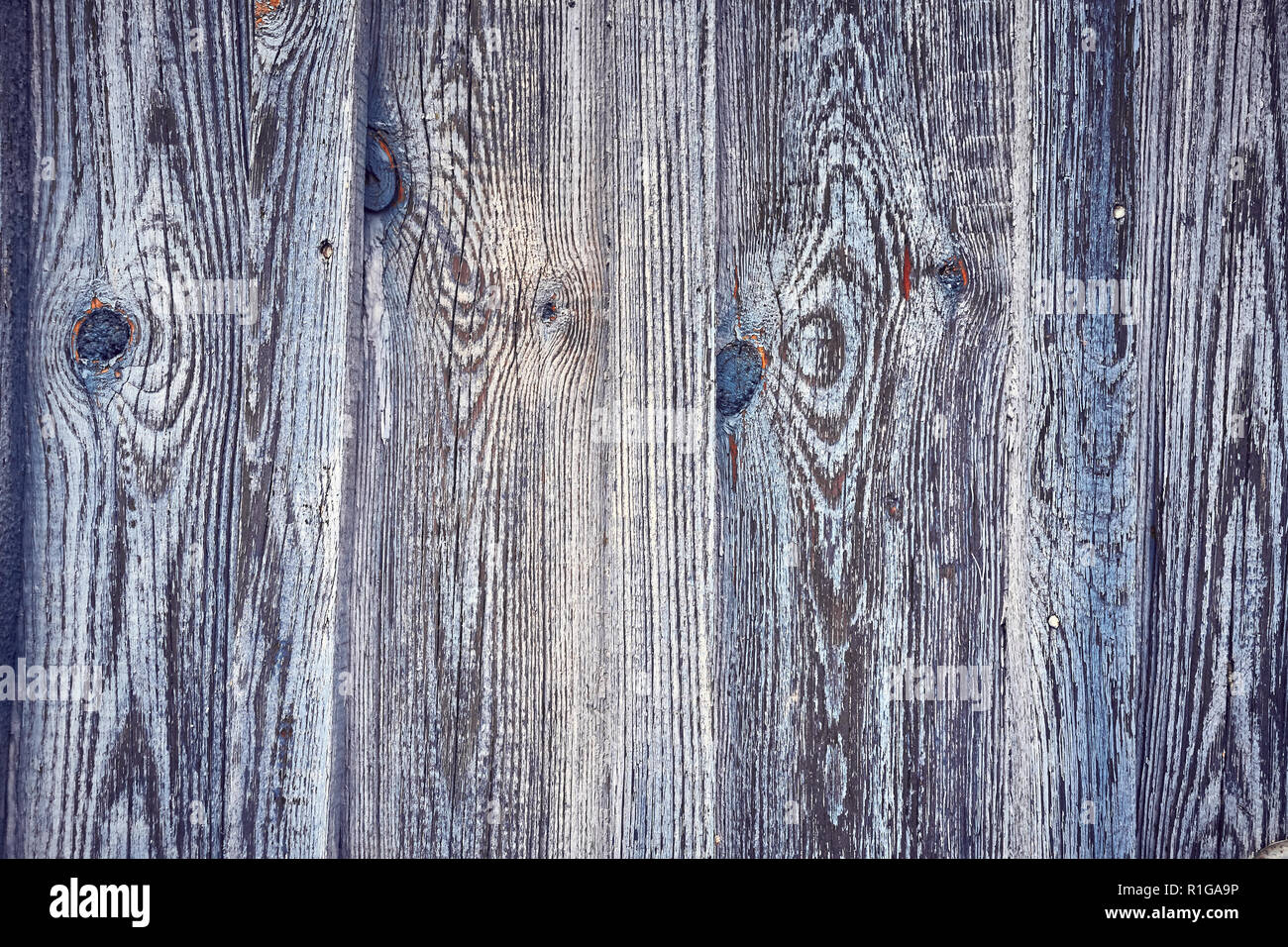 Vecchia parete in legno con pareti scrostate, sfondo o texture. Foto Stock