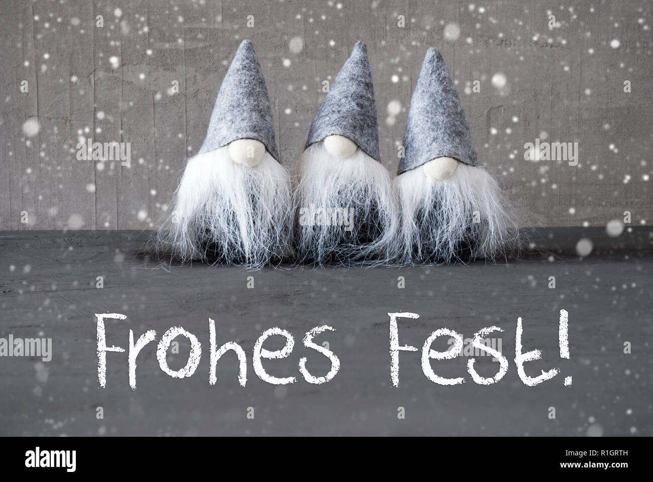 Gli gnomi, cemento, Frohes Fest significa Buon Natale Foto Stock