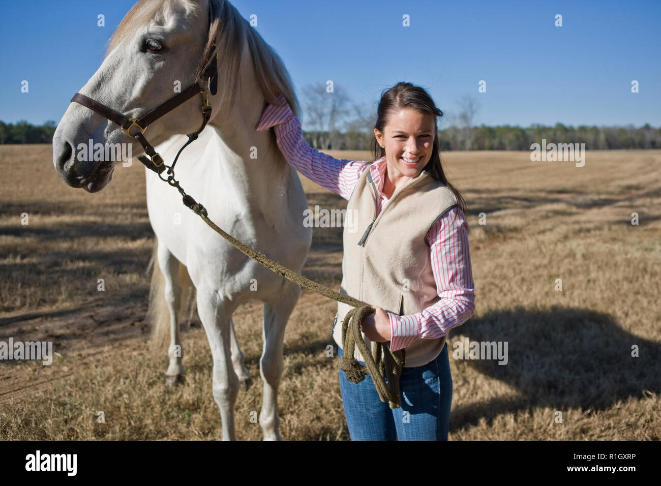 Ritratto di donna con il suo cavallo Foto Stock