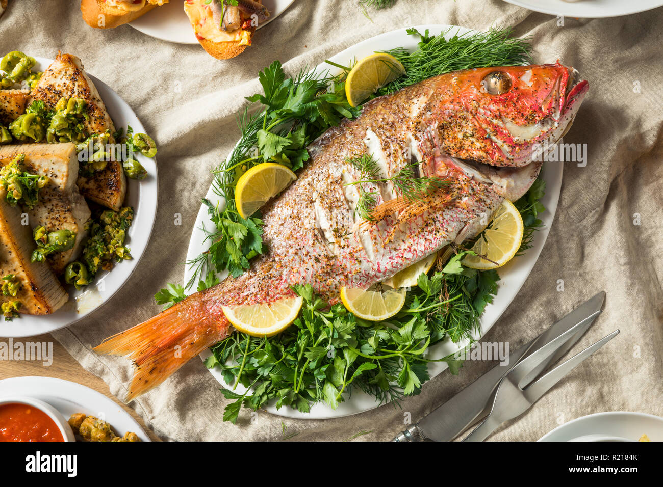 Vacanze Festa italiana di 7 pesci con Snapper Octopus e Pasta Foto Stock