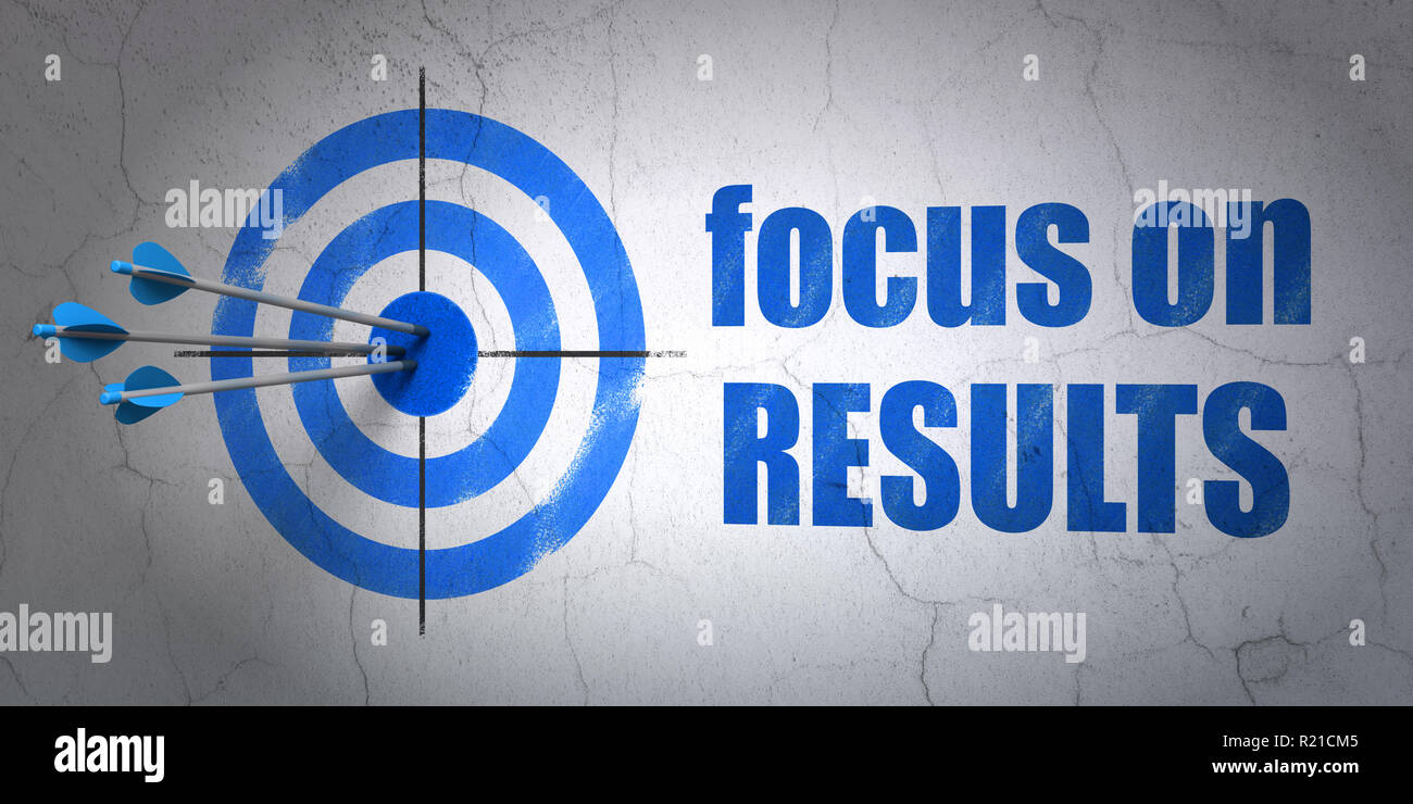 Il concetto di business: target e focus sui risultati su sfondo a parete Foto Stock