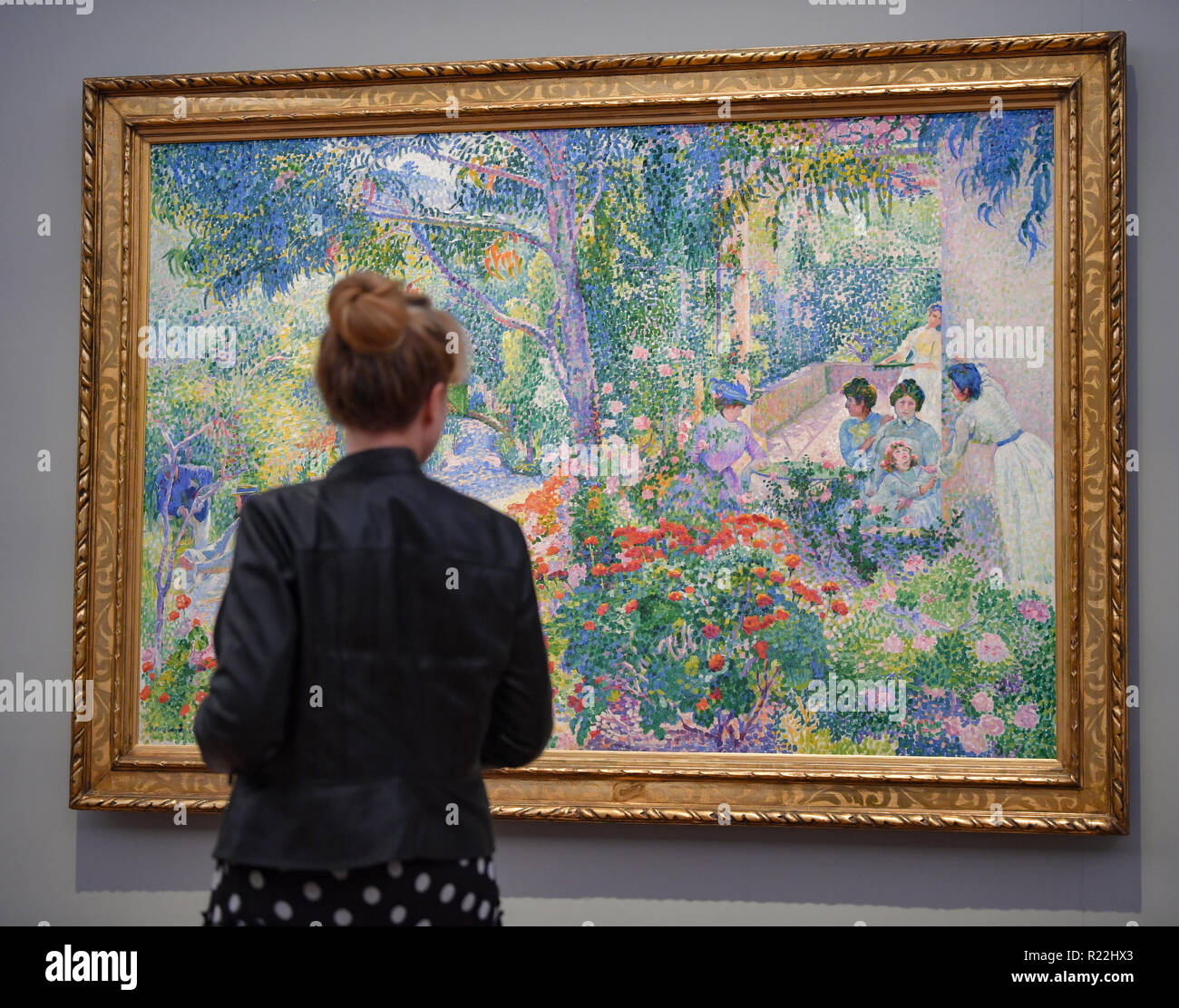 Potsdam, Germania. Xvi Nov, 2018. La pittura di olio dal titolo "Pomeriggio nel giardino, 1904' dal pittore Henri-Edmond Cross è in mostra presso il Museo Barberini nella nuova esposizione "Colore e luce. Il neo-impressionisti Henri-Edmond Cross'. La nuova mostra sarà rappresentato dal 17.11.2018 al 17.02.2019. Credito: Patrick Pleul/dpa-Zentralbild/ZB/dpa/Alamy Live News Foto Stock