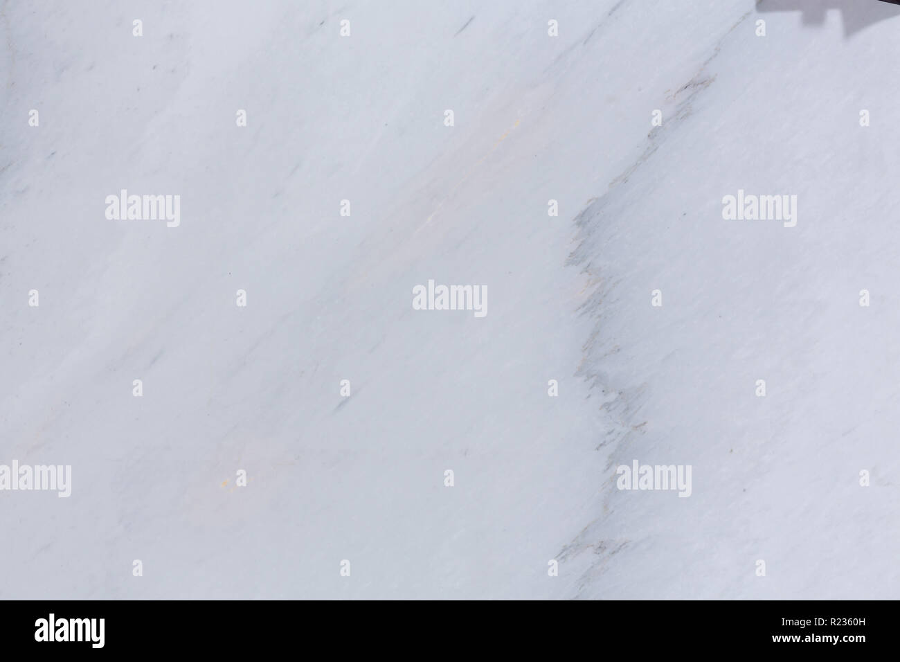 Close up di luce grigia pietra di marmo sfondo texture. Foto Stock