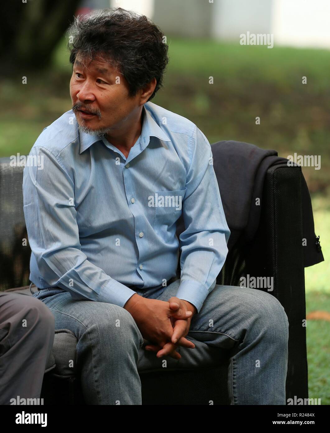 LOCARNO, Svizzera - Agosto 09, 2018: Ju-bong Gi assiste il 'Gangbyun Hotel' photocall durante la settantunesima Festival del Film di Locarno (Foto: Mickael Chavet) Foto Stock