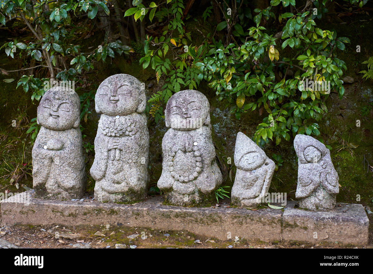 Tradizionale di pietra Jizo Bosatsu statue in Arashiyama, Kyoto, Giappone, Asia Foto Stock