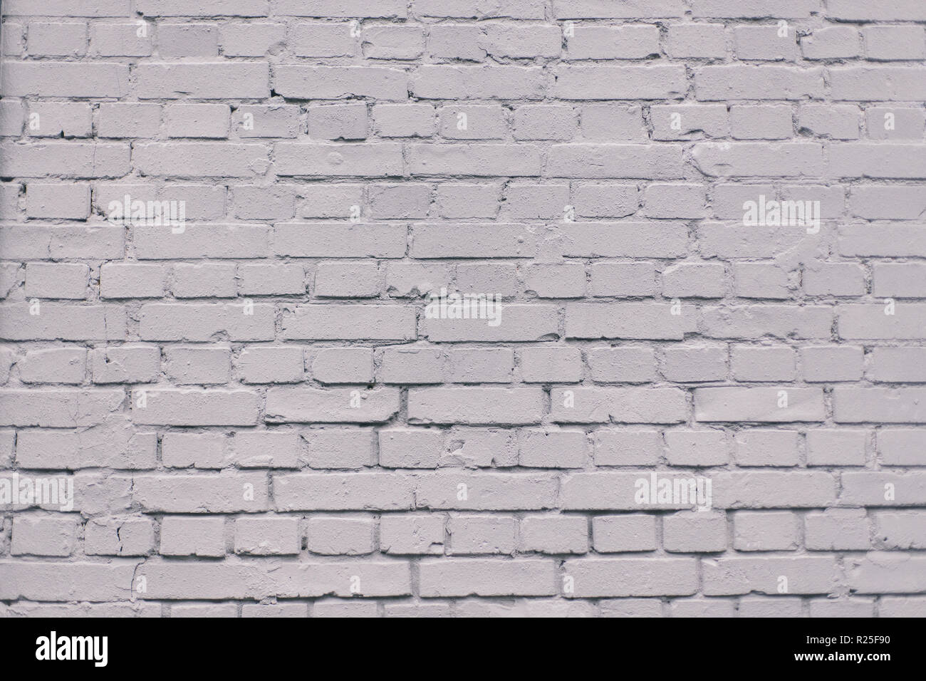 Grunge industriale verniciato grigio muro di mattoni background in Kiev, Ucraina. Può essere utilizzato nel design e interni. Foto Stock