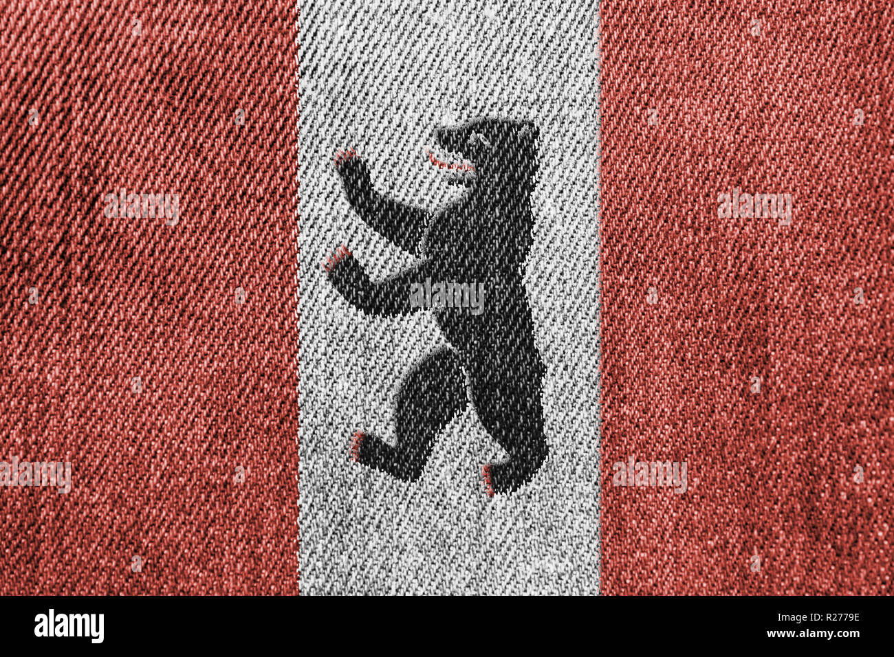 Industria tessile o di politica concetto: Berlino bandiera Jeans Denim Texture di sfondo Foto Stock