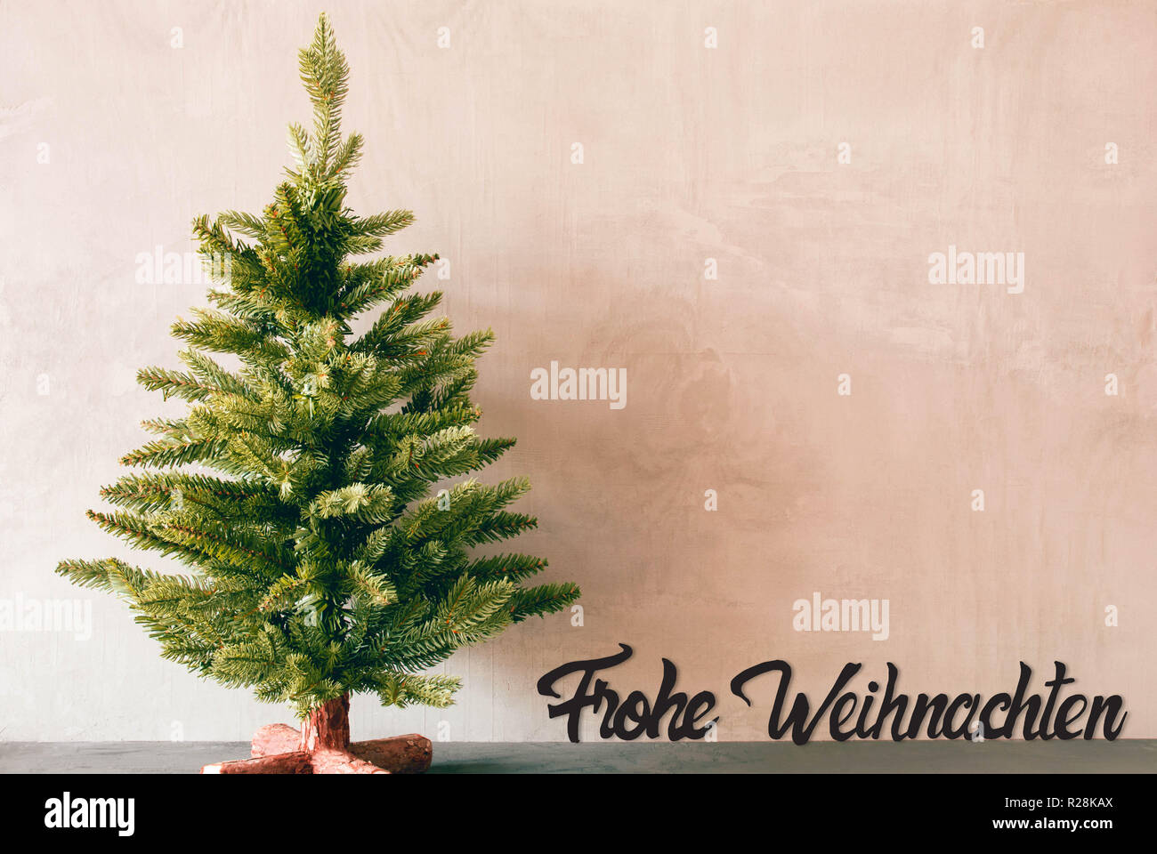 Albero verde, Calligrafia Frohe Weihnachten significa Buon Natale Foto Stock