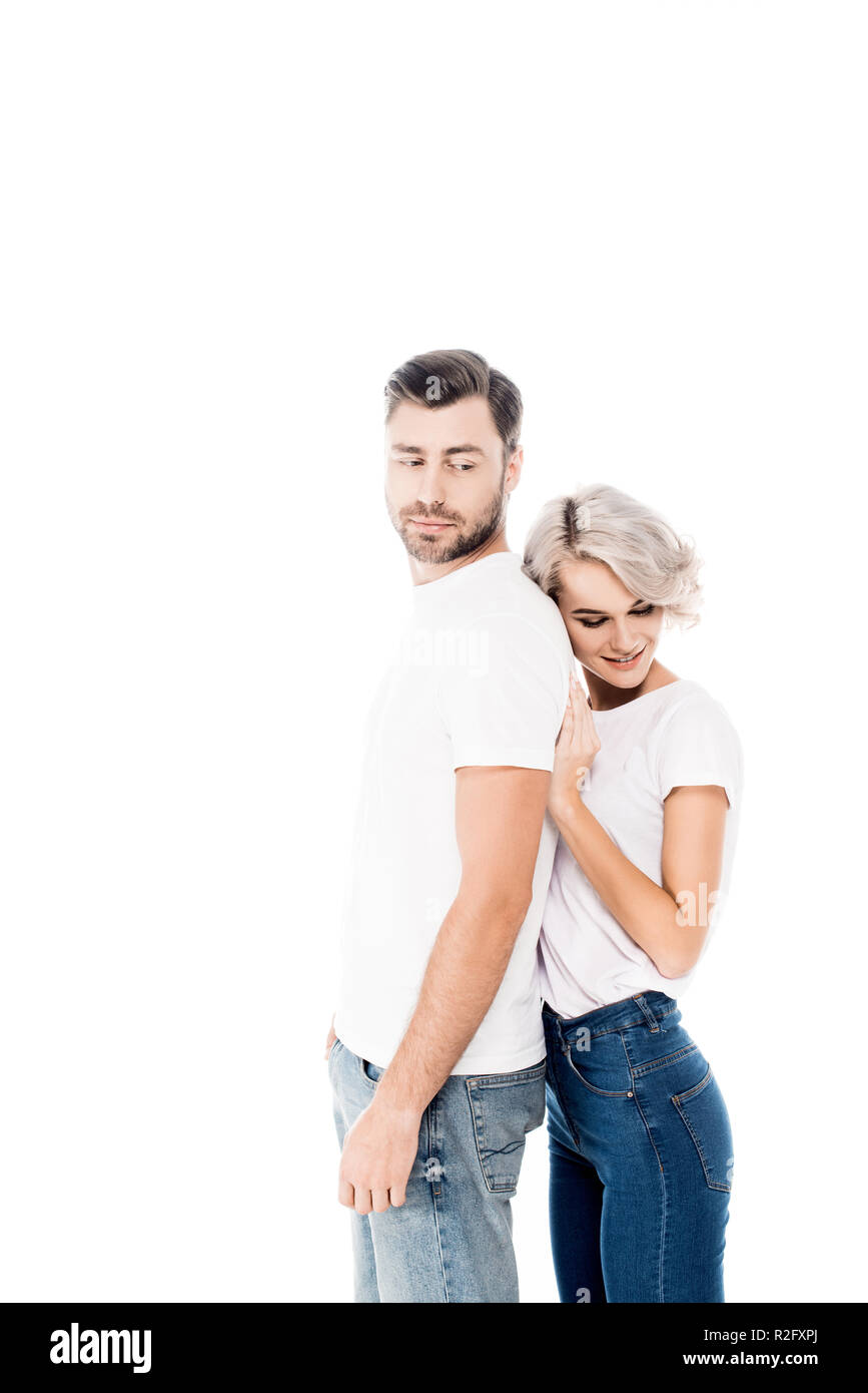 Splendida coppia di giovani adulti abbracciando isolato su bianco Foto Stock