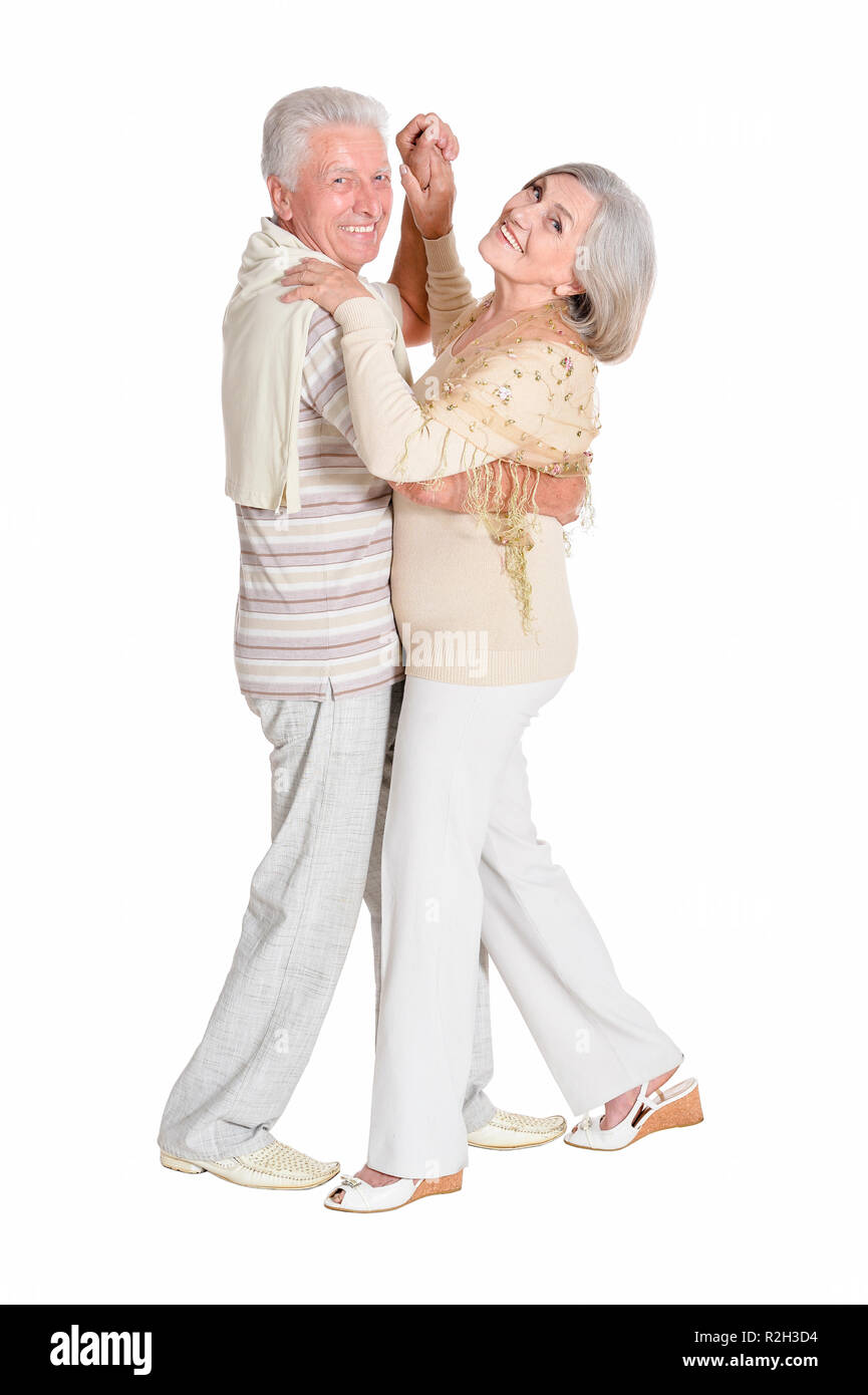 Ritratto di coppia senior danza su sfondo bianco Foto Stock