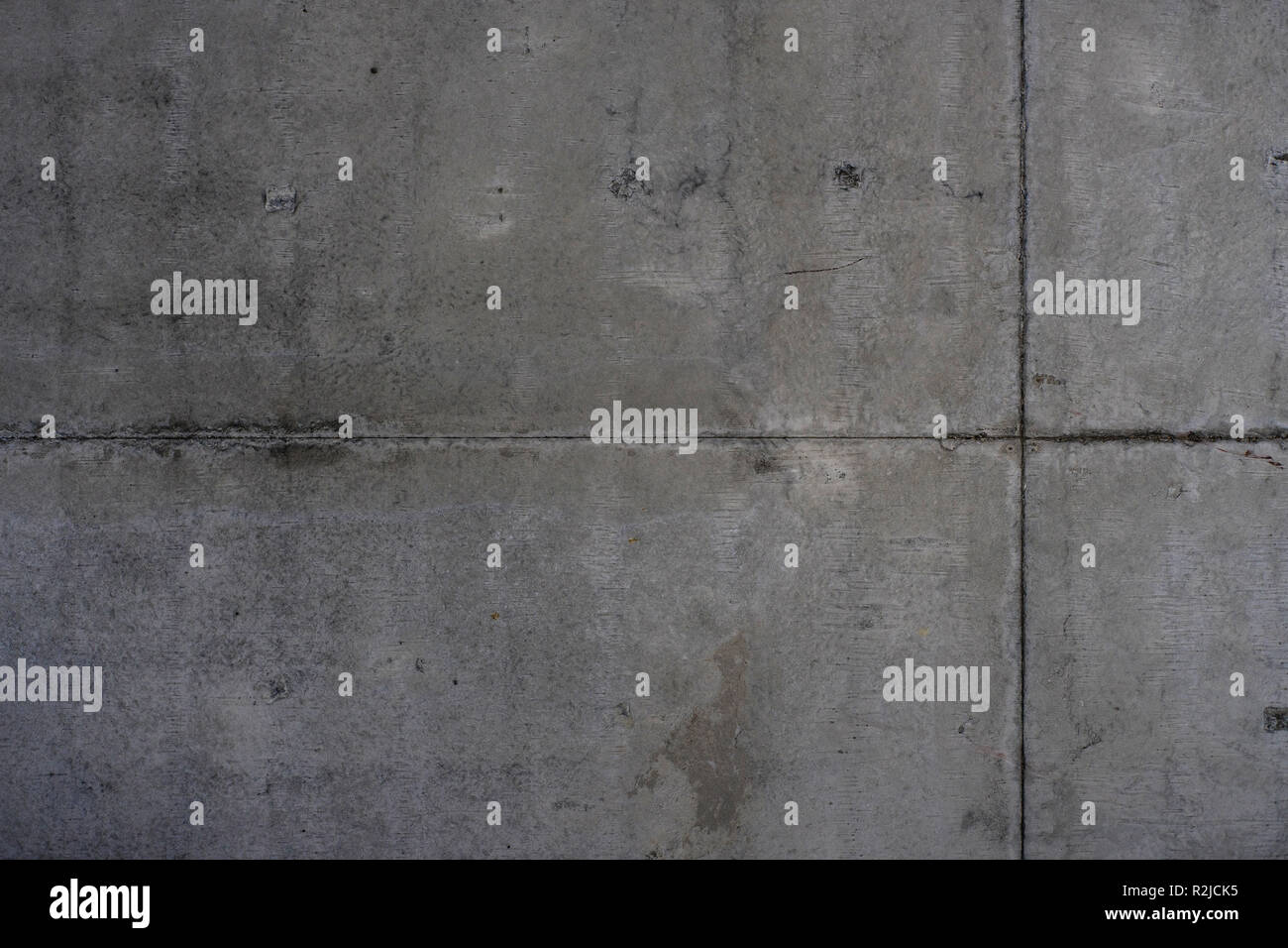 Un grungy vecchio texture in calcestruzzo di colore grigio Foto Stock