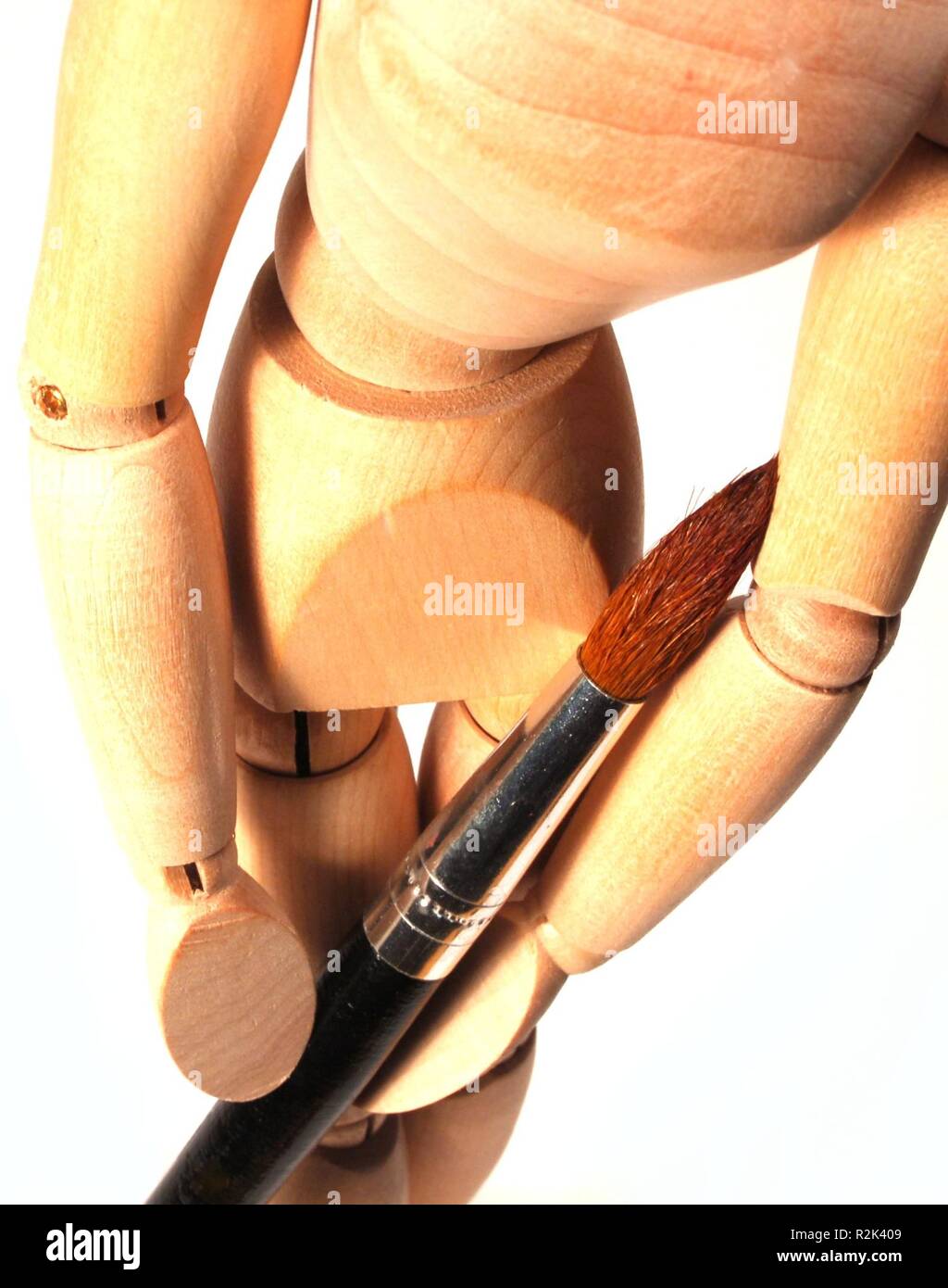 Figura in legno con spazzola Foto Stock