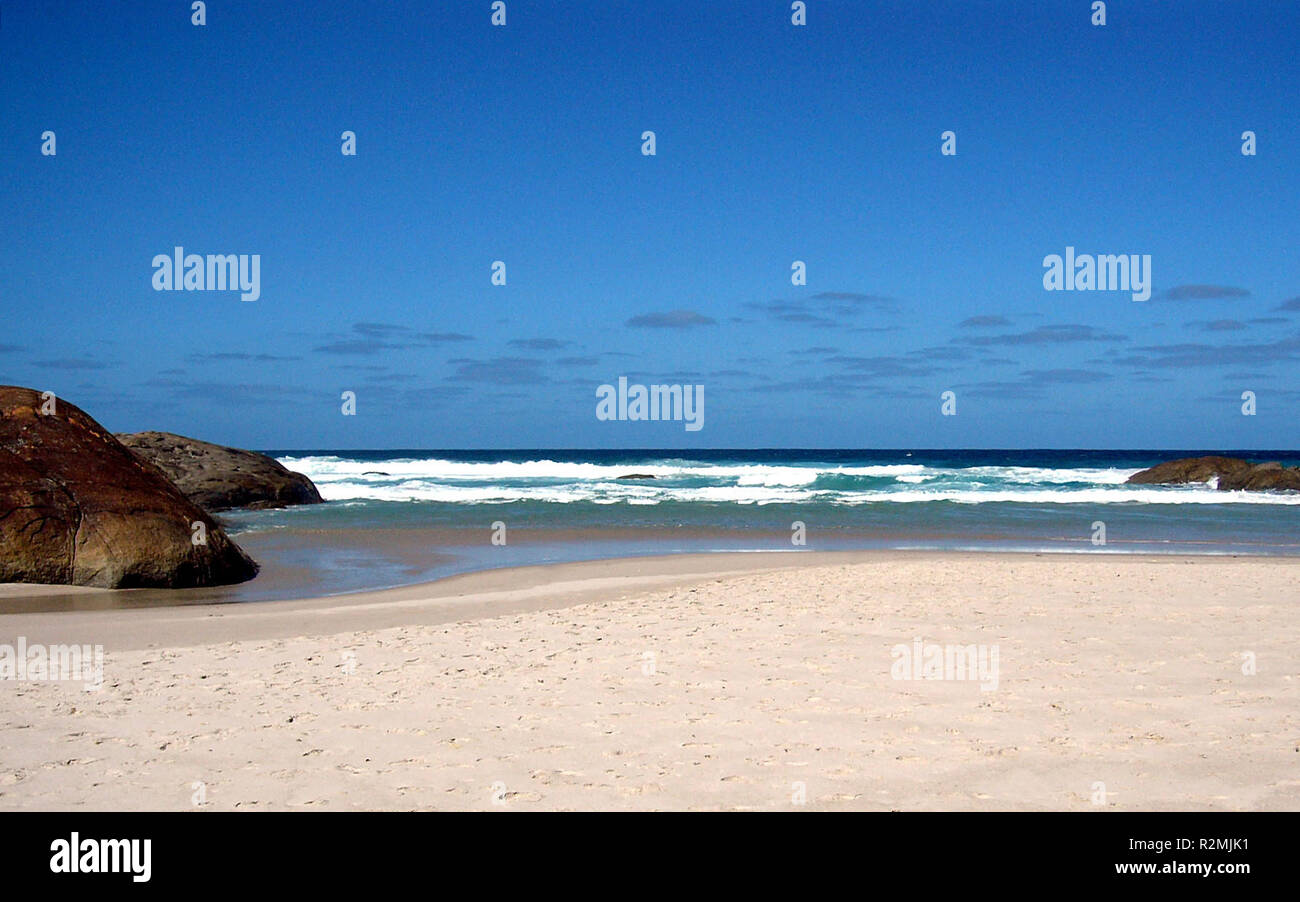 Sandy Bay con rocce Foto Stock