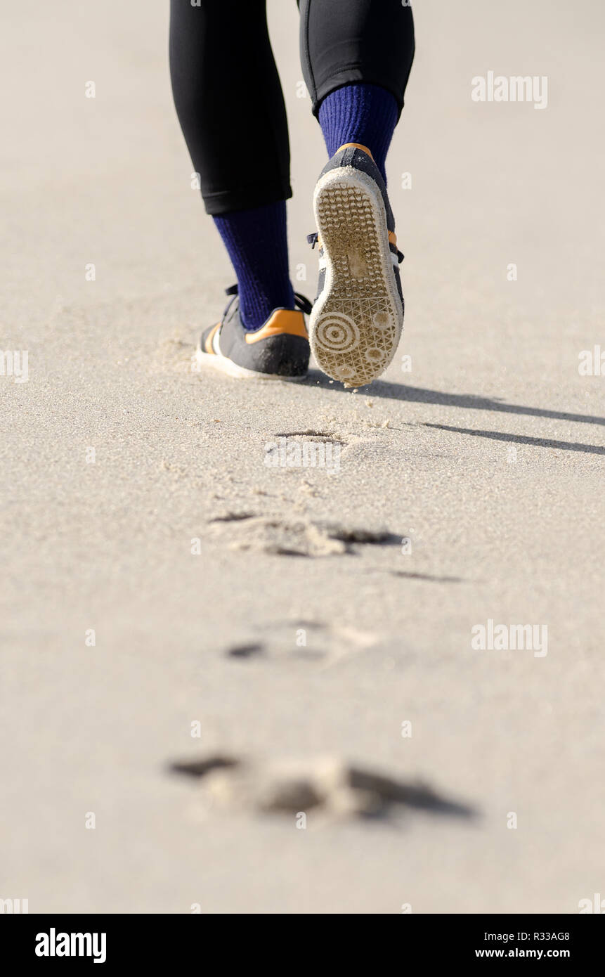 passeggiata sulla spiaggia Foto Stock