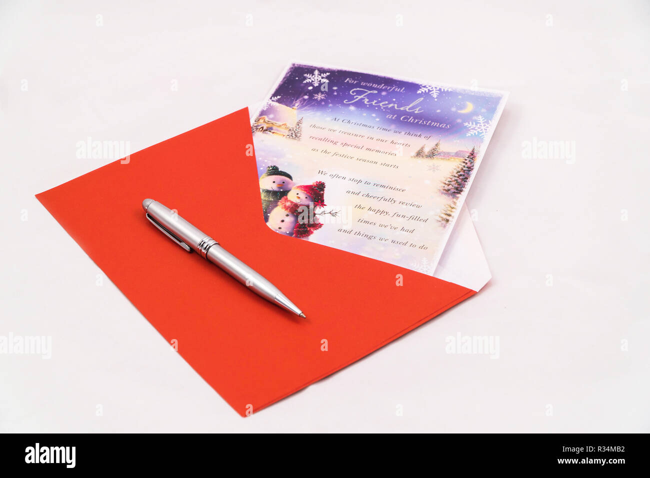 Scheda Di Natale Per Il Figlio E La Nuora Con Busta Rossa E Penna Su Sfondo Bianco Foto Stock Alamy