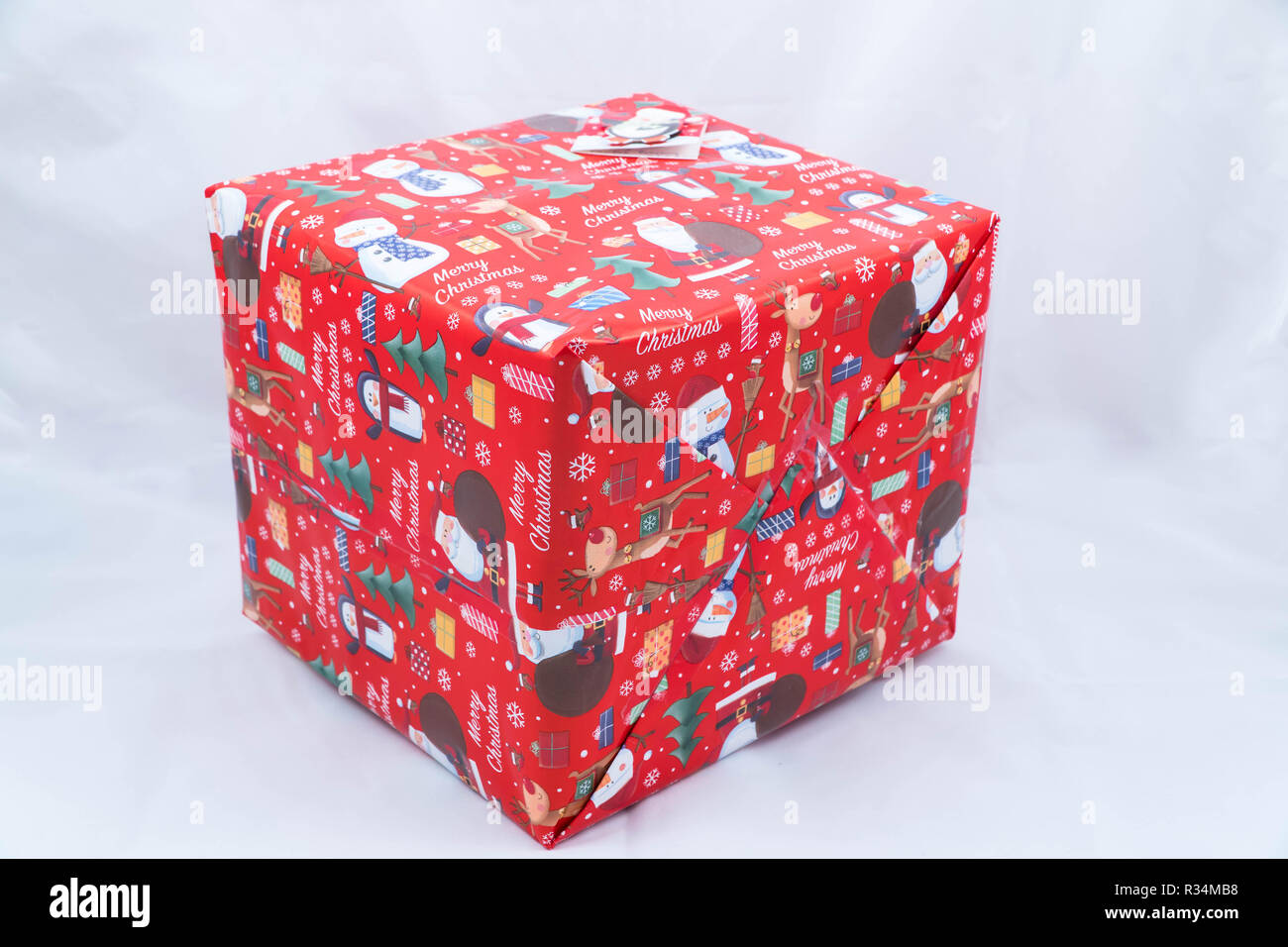 Natale presant avvolto in padre carta di Natale Foto Stock