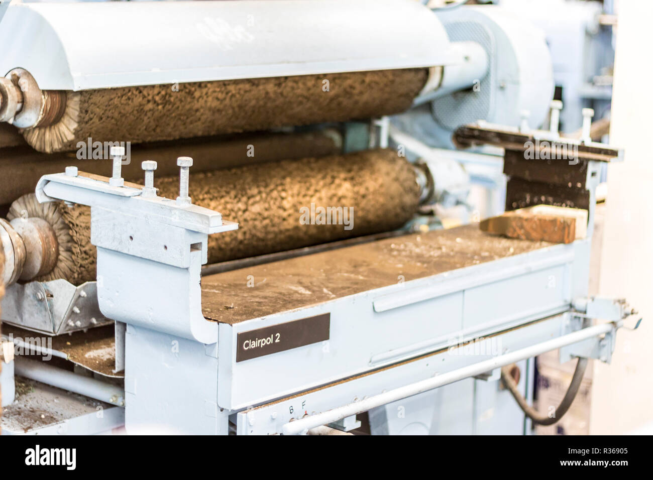 Vecchia macchina in fabbrica, fabbrica di macchinari concetto, Newbridge Posate Azienda, argenteria, posate in argento cucchiai gioielli, industriale Foto Stock