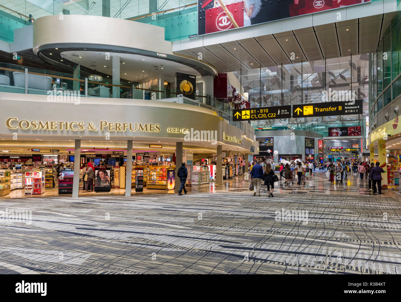 Il terminale 3 del centro commerciale di transito presso l'Aeroporto Changi di Singapore Foto Stock