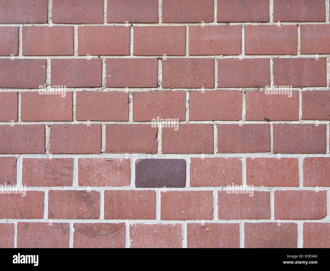 Rosso di un muro di mattoni con una più scura in mattoni, Texture di sfondo Foto Stock