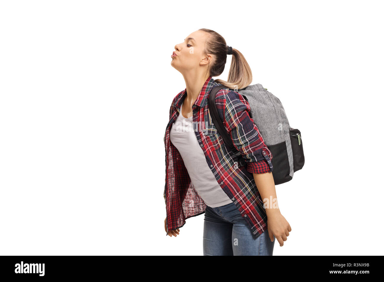 Studente ragazza soffia un bacio isolati su sfondo bianco Foto Stock