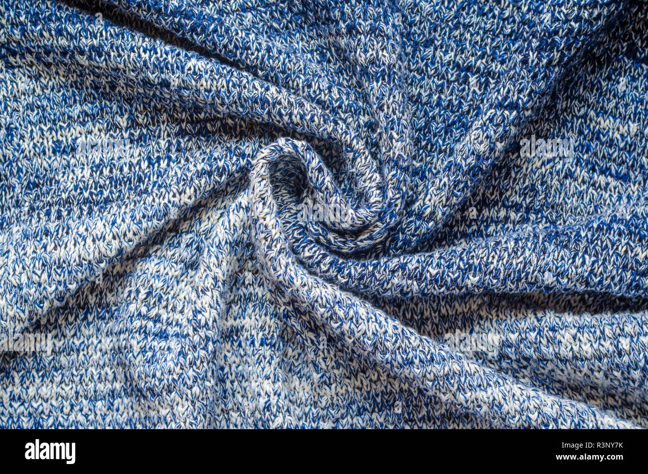 Blue Melange maglione filato ritorto dello sfondo. Ritorto in panno centro swatch di felpa lavorata a maglia Foto Stock