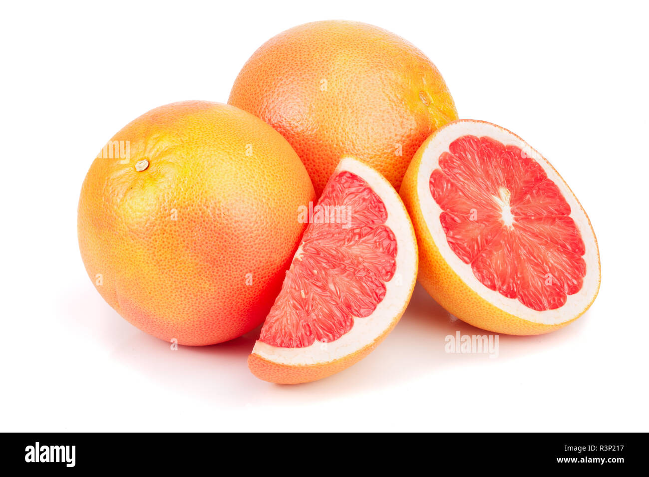 Pompelmo e fette isolati su sfondo bianco Foto Stock
