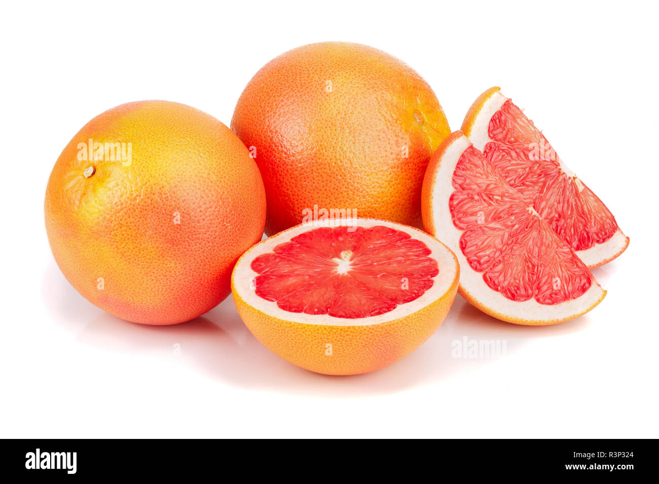 Pompelmo e fette isolati su sfondo bianco Foto Stock
