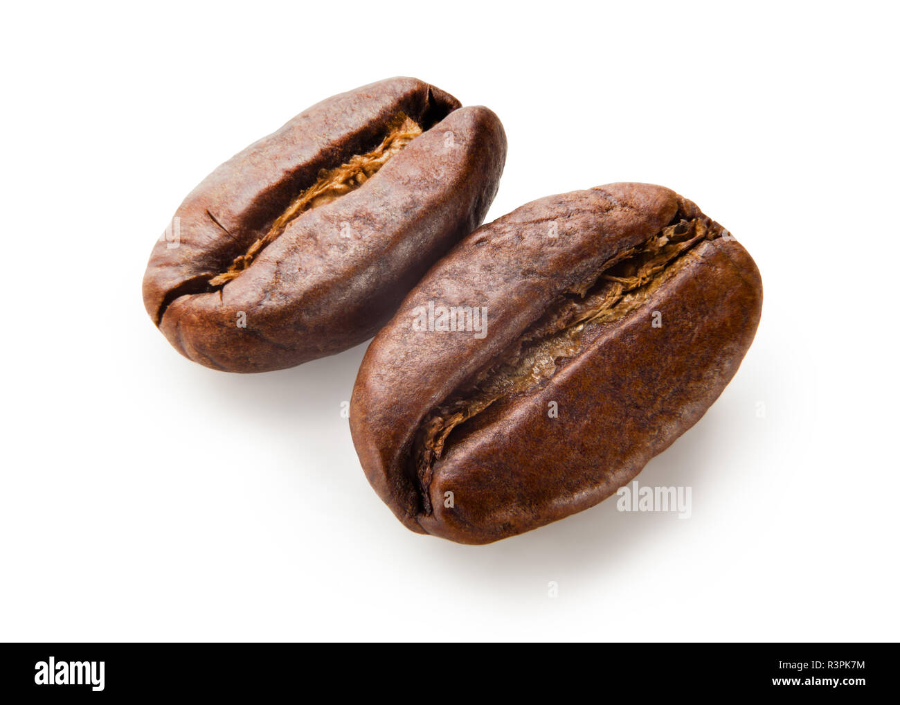 Il caffè. I chicchi di caffè isolato su sfondo bianco Foto Stock