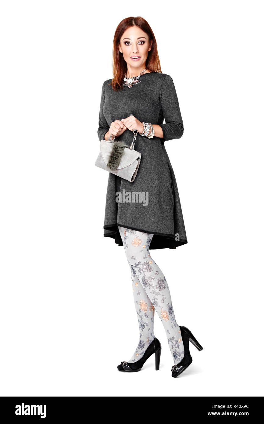 Sorpreso di donna con la borsa della frizione Foto Stock