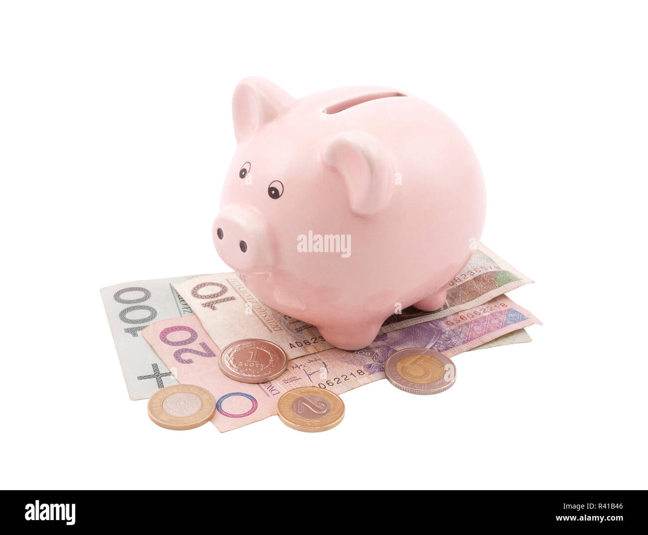 Salvadanaio sul polacco di banconote. Percorso di clipping incluso. Foto Stock