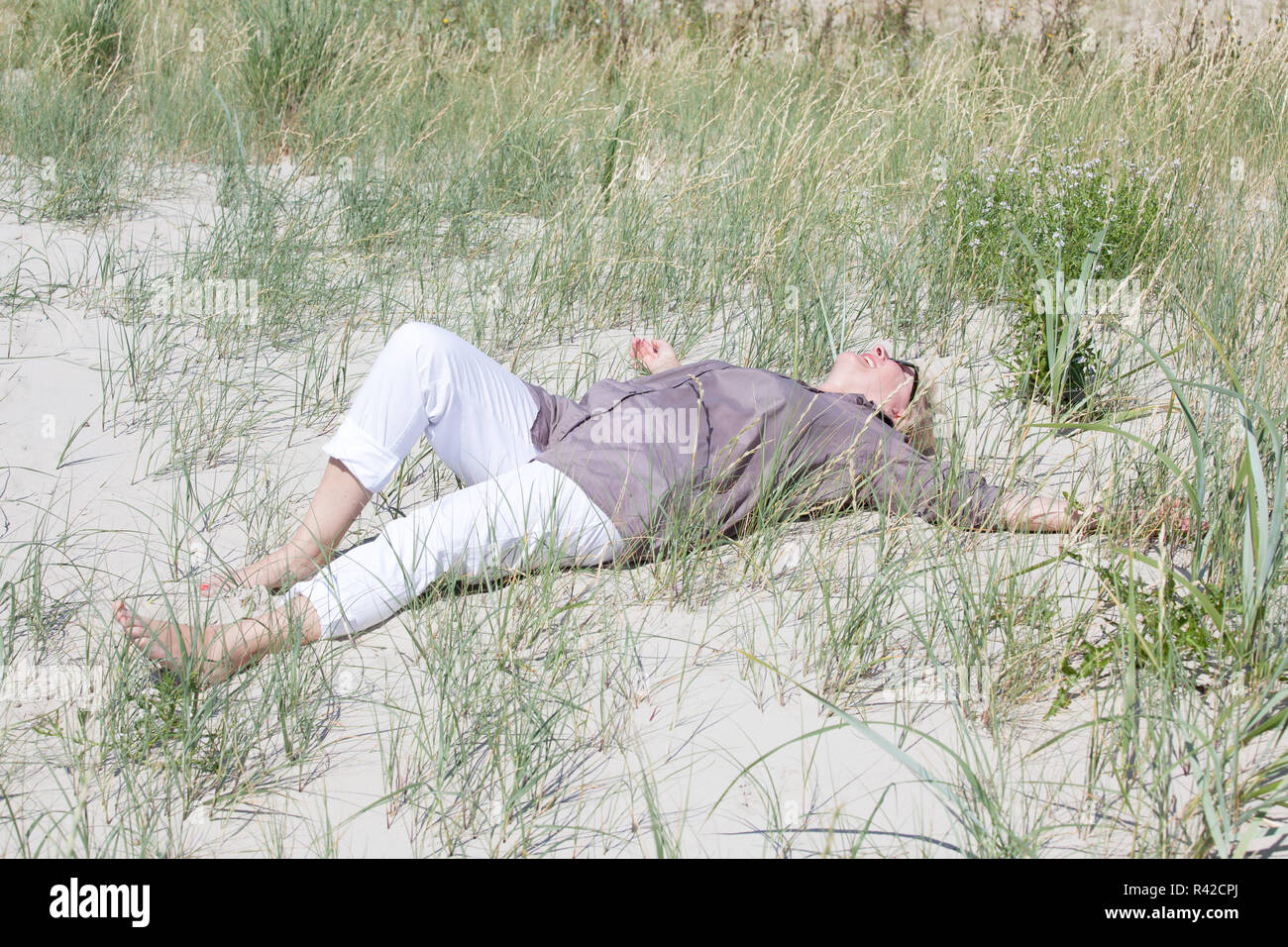 Vacanziere è nelle dune Foto Stock