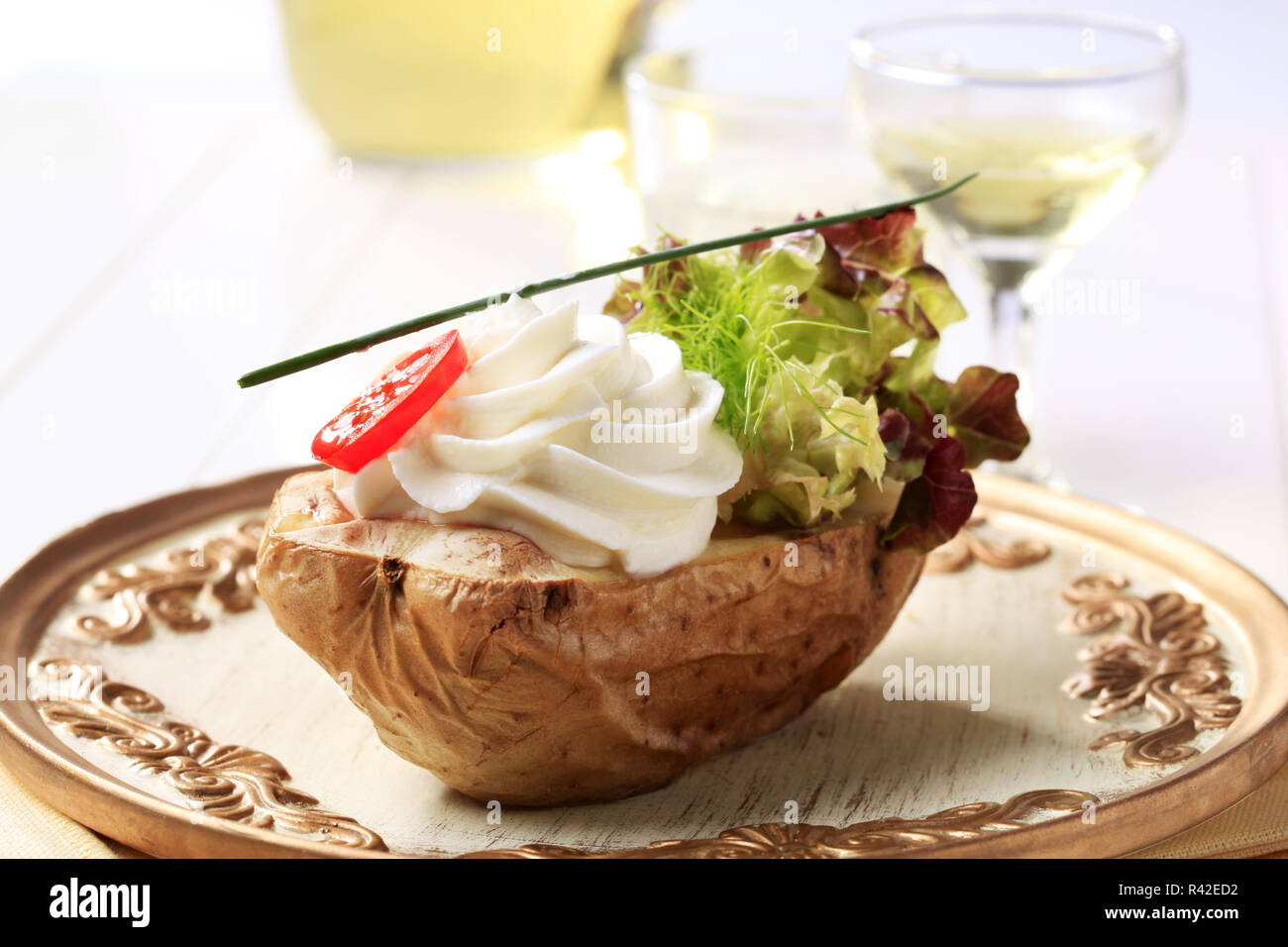 Patate al forno e crema spalmabile Foto Stock