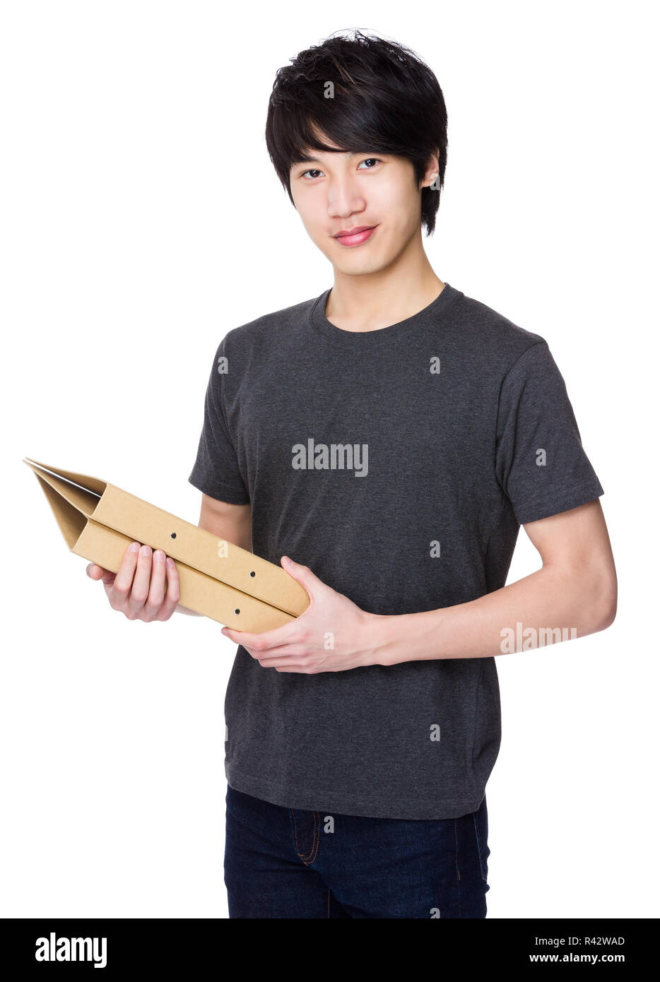 Asian giovane tenere con cartella Foto Stock