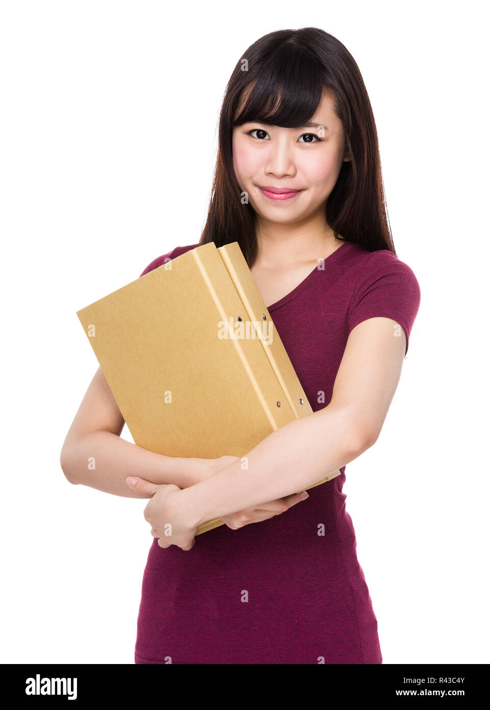 Donna asiatica di attesa con cartella Foto Stock