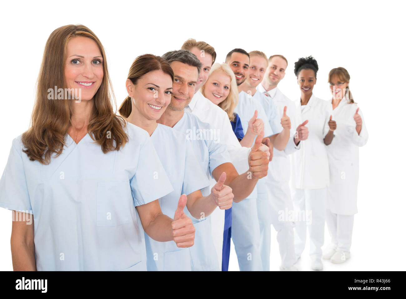 Fiducioso Team Medico mostrando pollice in su in linea Foto Stock