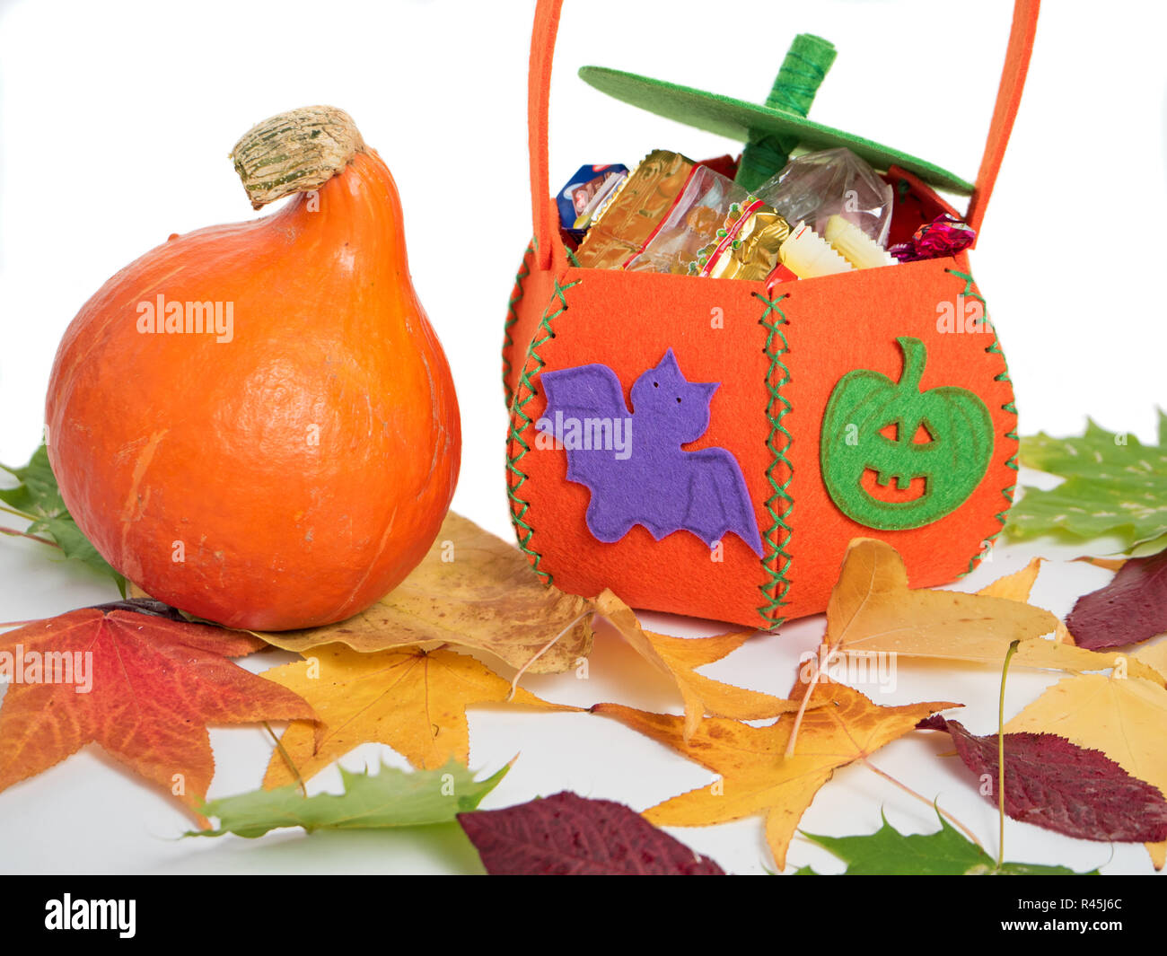 Zucca di Halloween con sacco Foto Stock