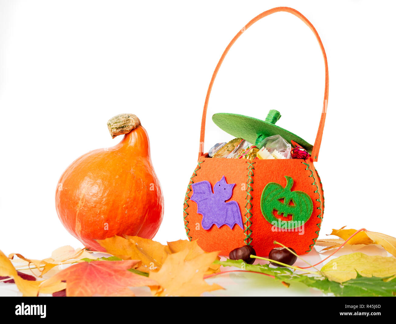 Zucca di Halloween con sacco Foto Stock