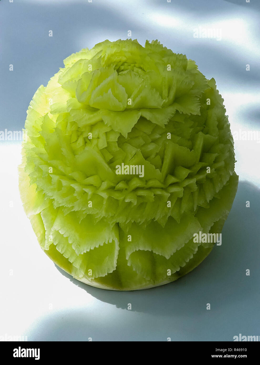 Il melone Cantalupo display carving Foto Stock