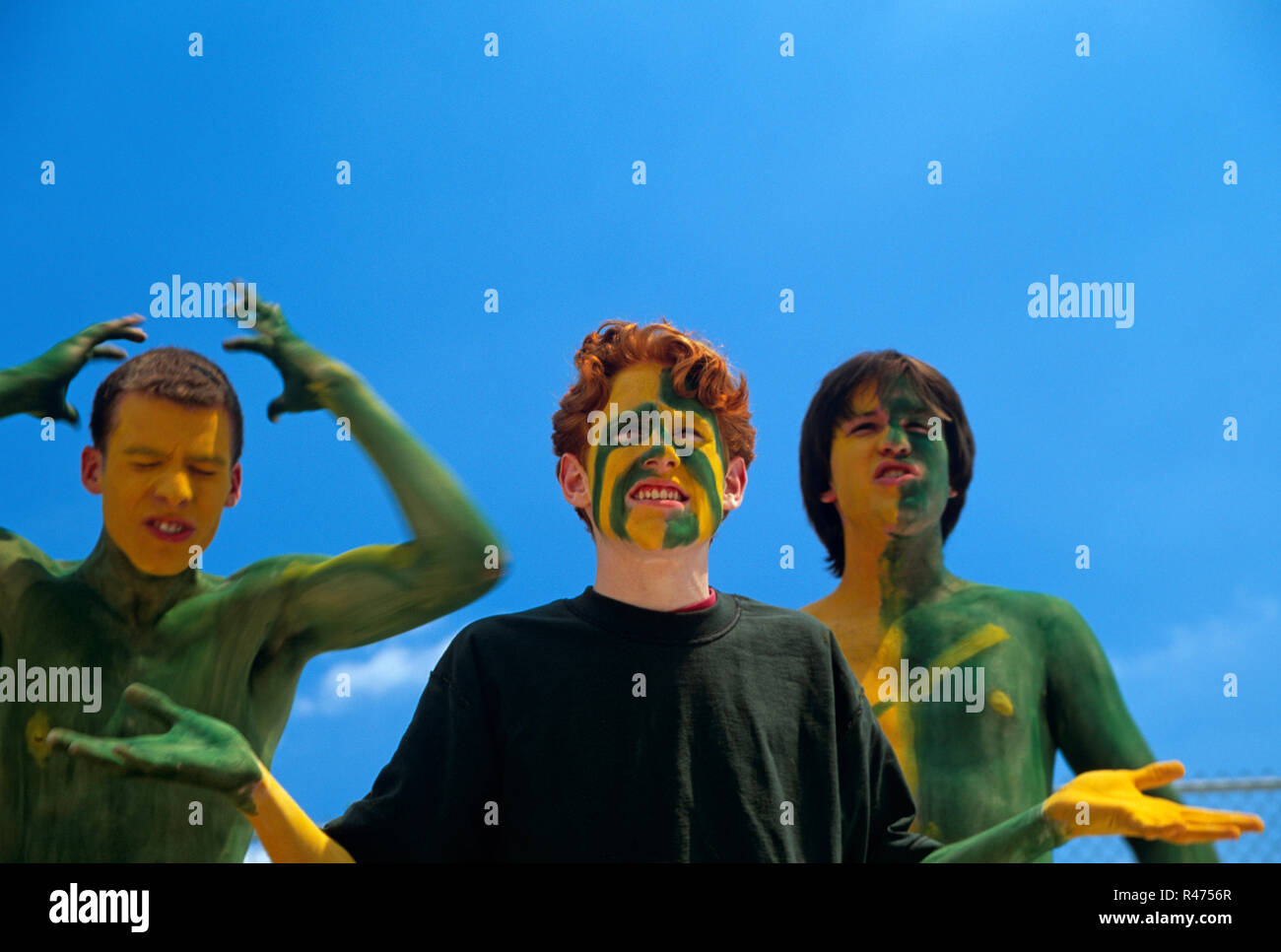 Entusiasti appassionati di sport con facce dipinte in una partita di calcio, STATI UNITI D'AMERICA Foto Stock