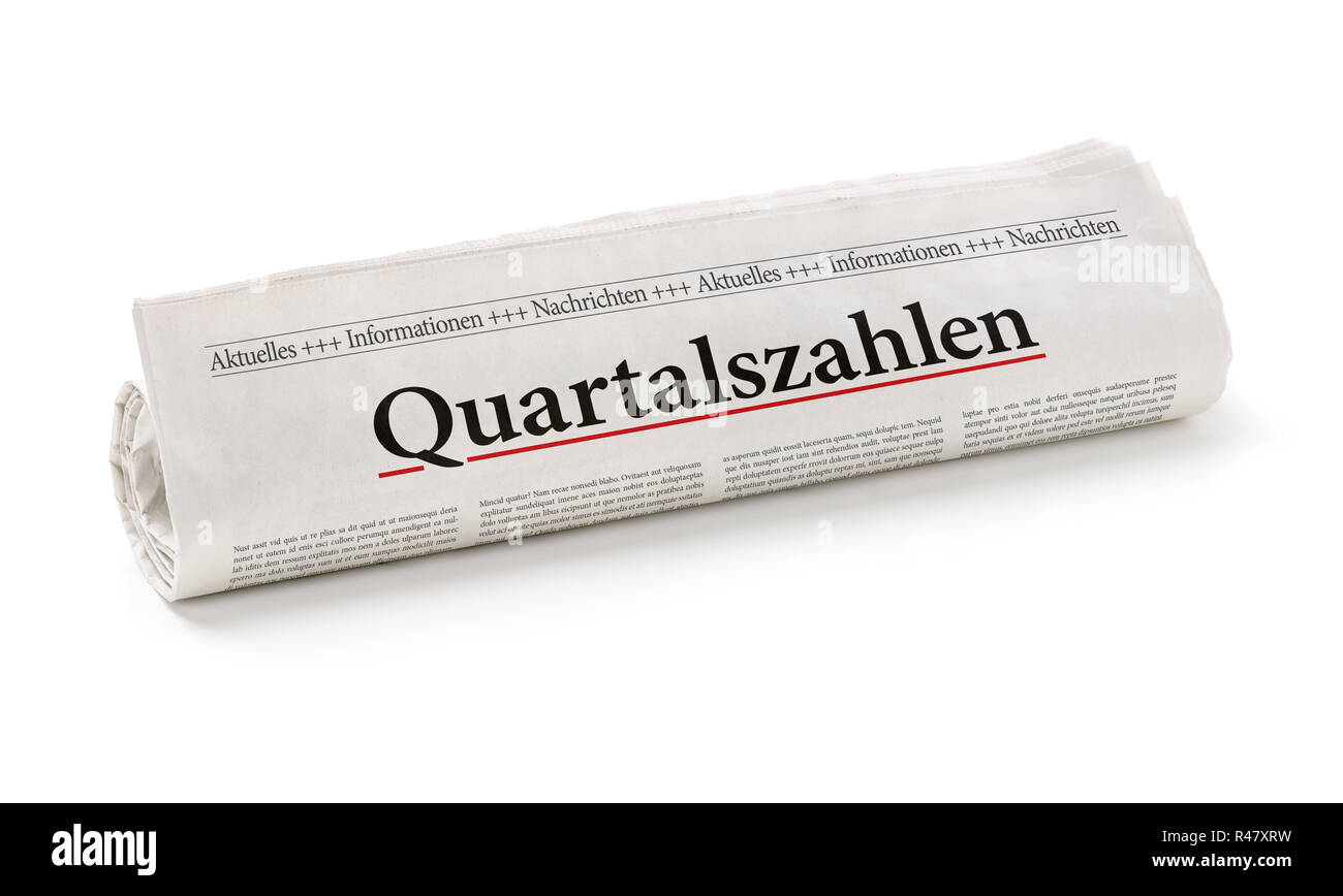 Rotolo di giornale con il titolo di dati trimestrali Foto Stock