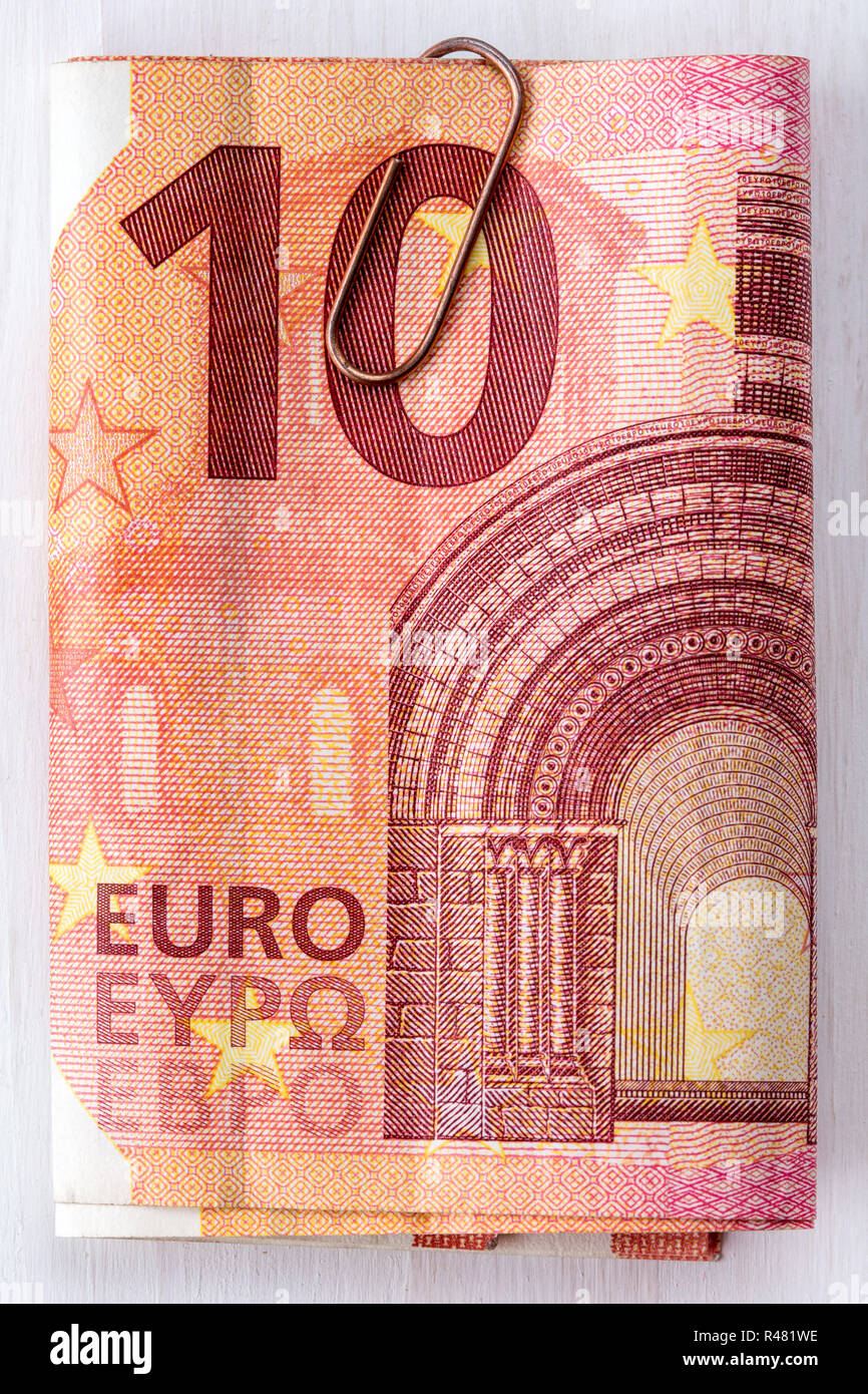 Dieci euro con clip di carta Foto Stock