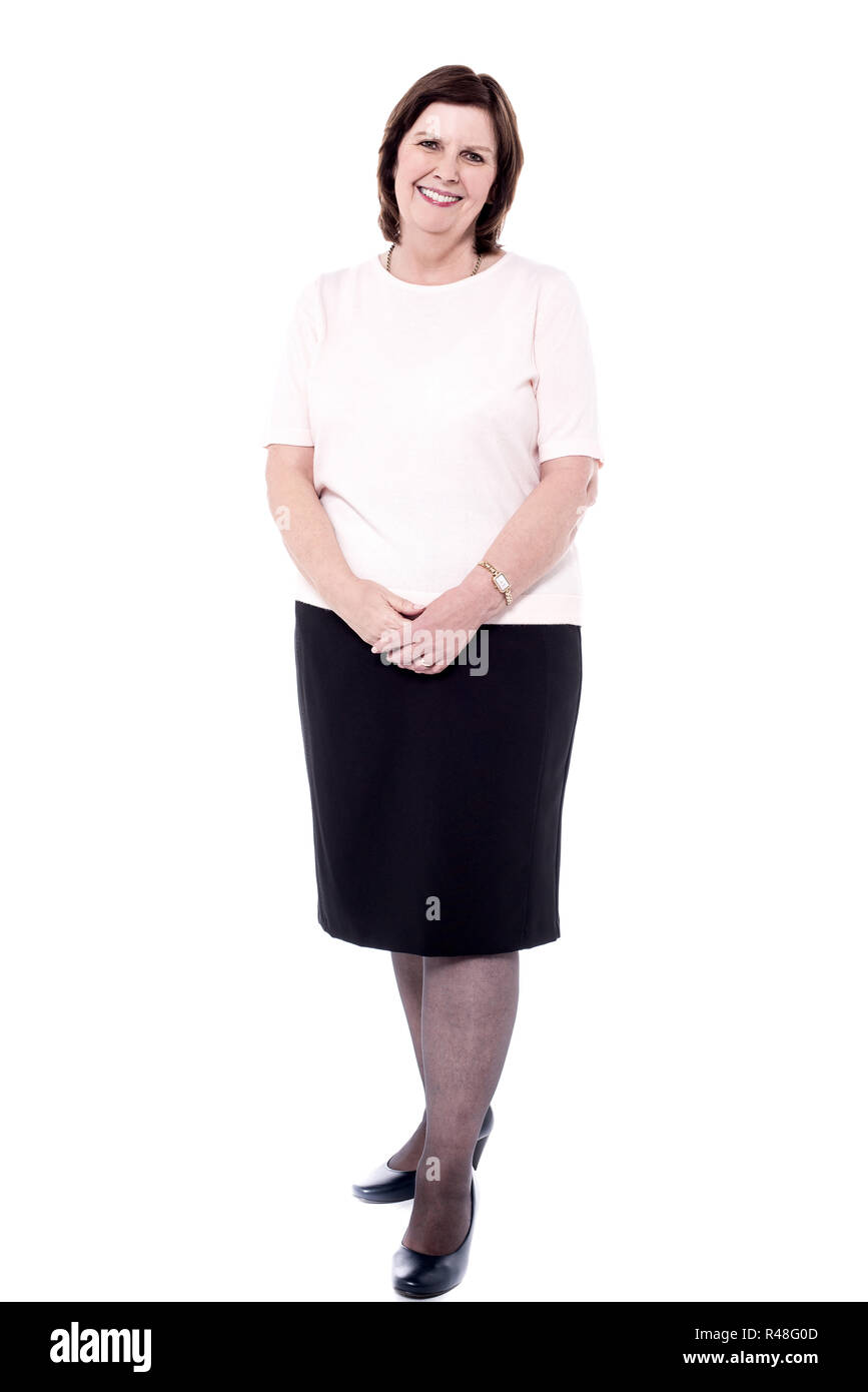 Senior donna posa casualmente Foto Stock Senior donna posa casualmente Foto Stock