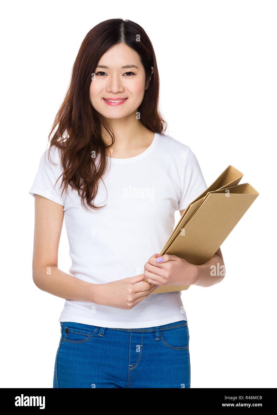 Asian giovane donna tenere con cartella Foto Stock