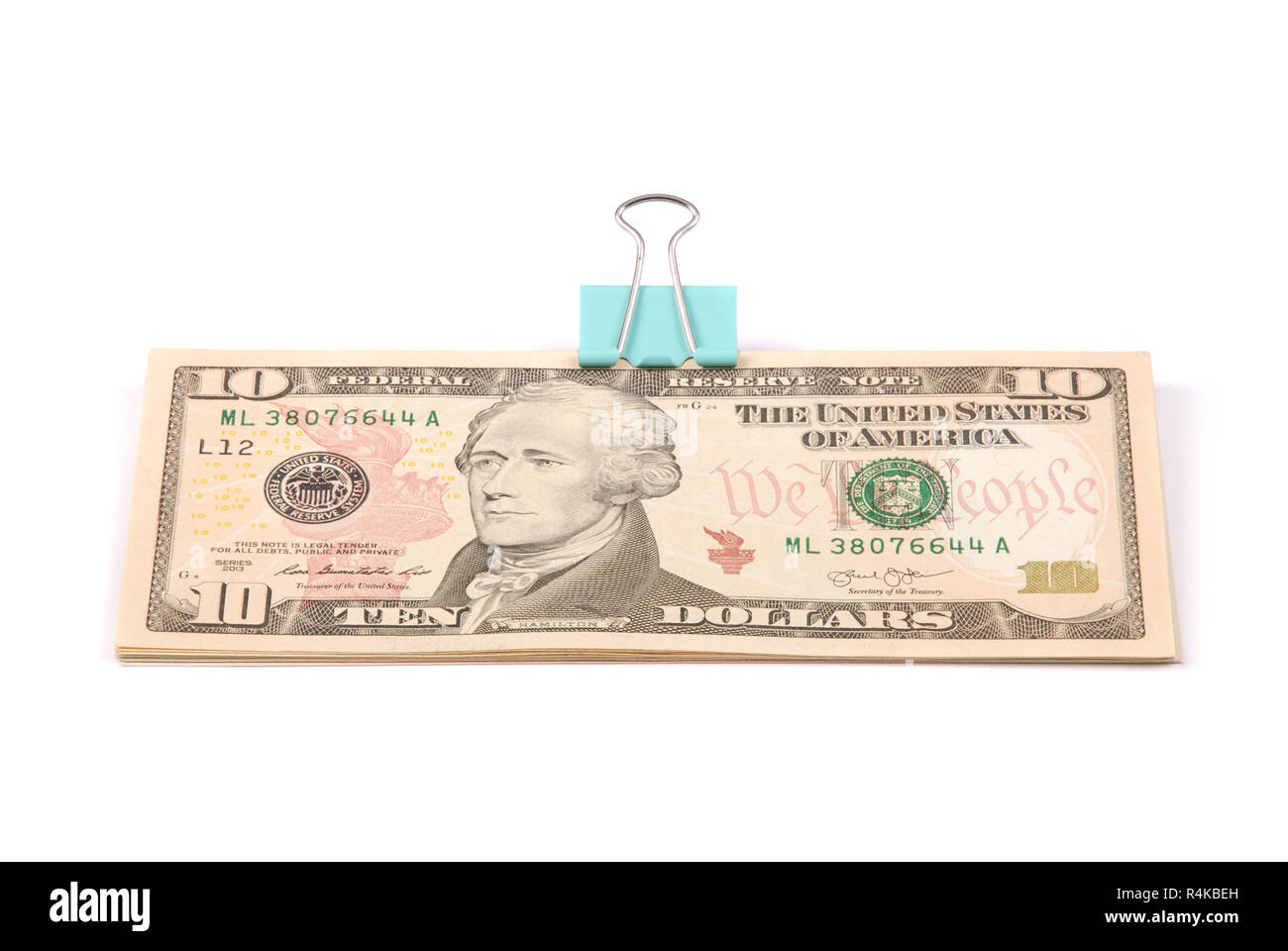 Mazzette di soldi dieci dollari isolati su sfondo bianco Foto Stock