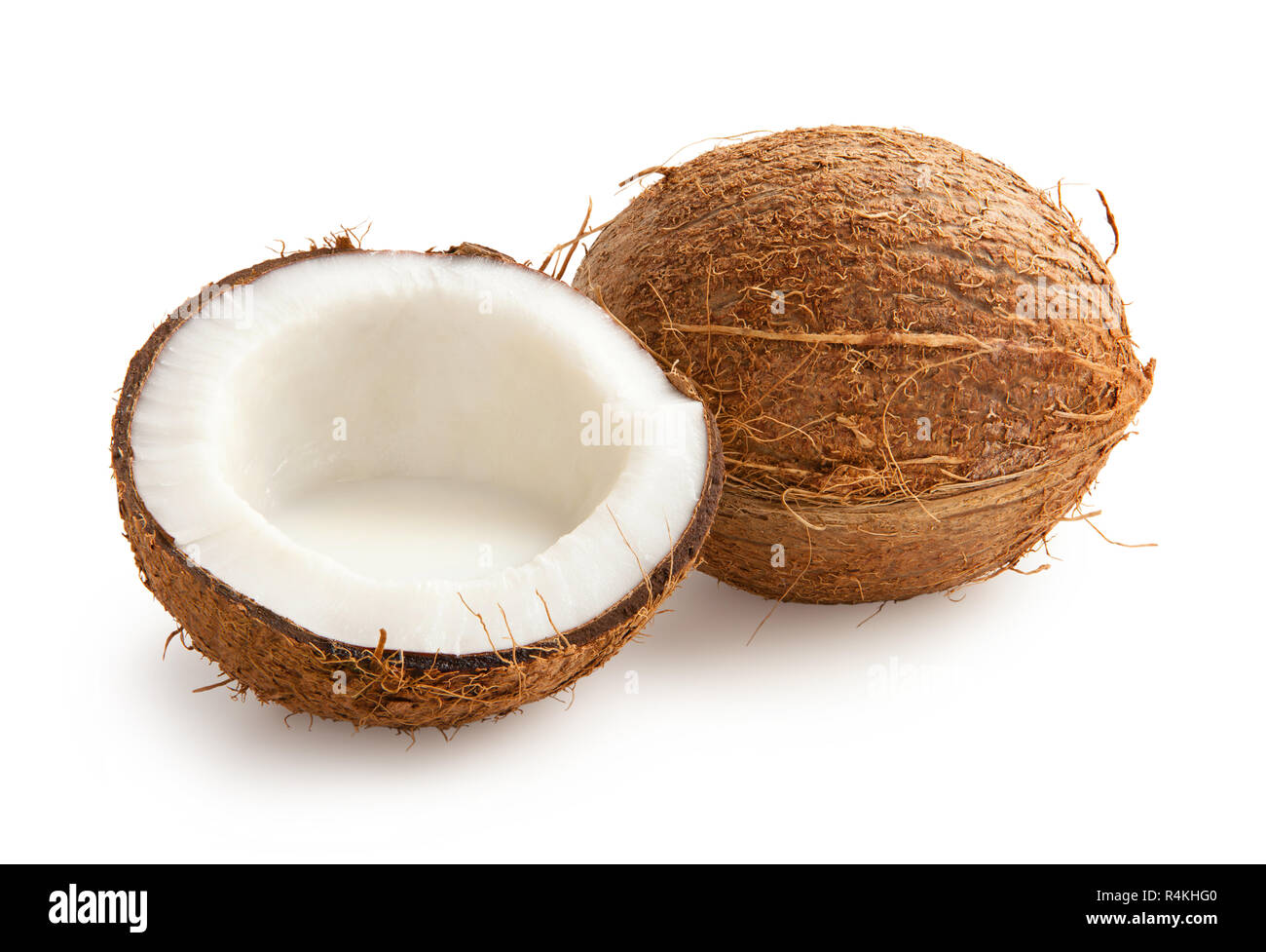 Noce di cocco. Noce di cocco con metà isolato su sfondo bianco Foto Stock