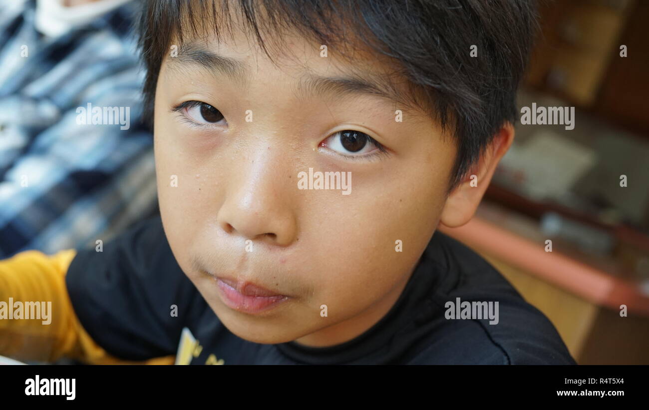Bambino asiatico Foto Stock