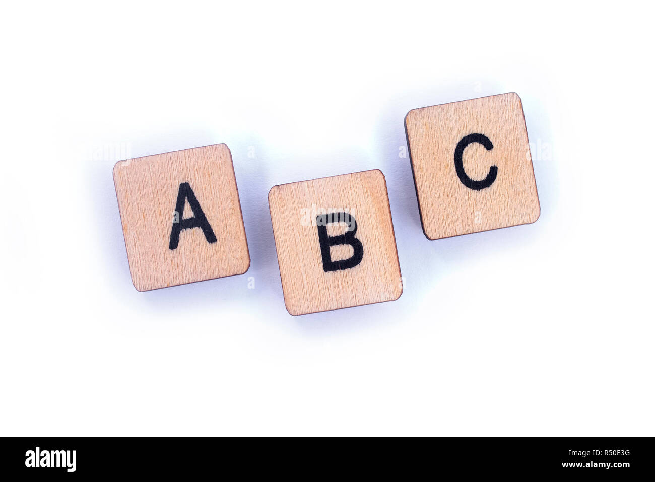 Le lettere ABC, farro con lettera in legno piastrelle Scrabble. Foto Stock