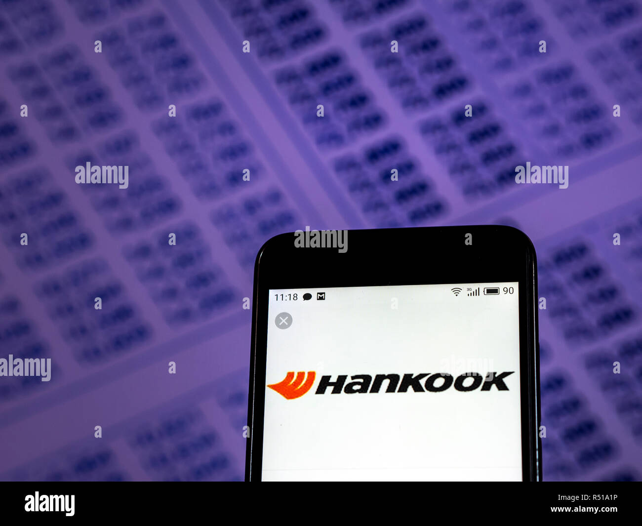 Pneumatico Hankook logo azienda vede visualizzato sul telefono intelligente. Foto Stock