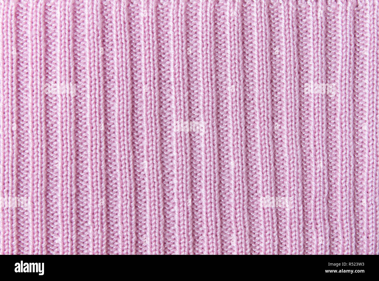 Rosa linea verticale di maglia o di tessuto a maglia Texture di sfondo di pattern Foto Stock